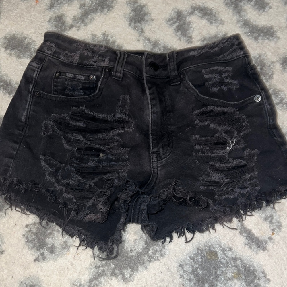 Black ripped american eagle shorts